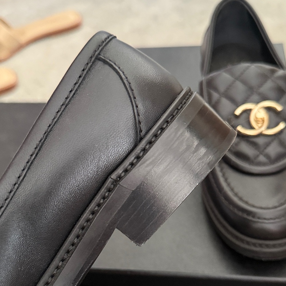 CHANEL Black Quilted Slip-On Loafers with Gold Accents - Picture 3 of 4
